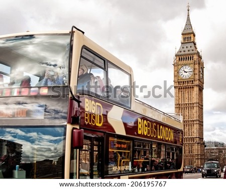 LONDON, UNITED KINGDOM - MARCH 24: The Elizabeth Tower and tourist bus on March 24, 2014 in London. The Clock Tower, named in tribute to Queen Elizabeth II, known as Big Ben.