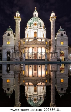 VIENNA, AUSTRIA - MAY 4: Night view from St. Charles's Church in Vienna on May 4, 2014. Karlskirche is a baroque church, dedicated to St. Charles Borromeo, a great reformer of the 16th century.