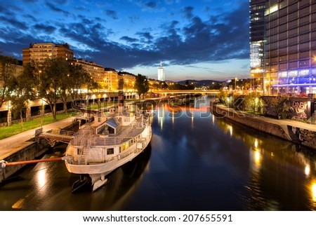 VIENNA, AUSTRIA-MAY 5: Boat on Danube Canal in Vienna on May 5, 2014. The Danube Canal bifurcates from the main river in Dobling, and joins it again at the Prater.