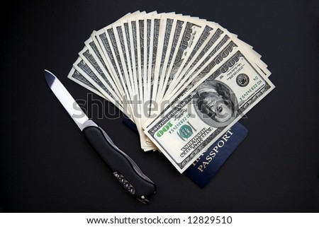 American dollars, swiss knife and blue passport