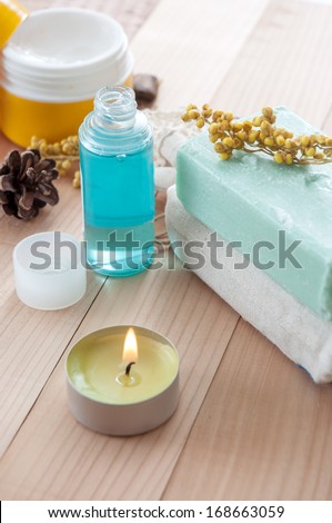Spa sitting with handmade soaps ,candle , massage oil