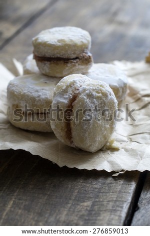 Homemade  small round cookies  on vintage wooden table, close up