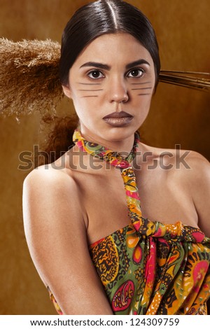 Woman in ethnic dress in the studio portrait