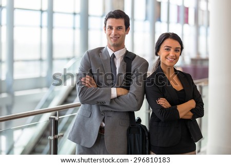 Strong confident poses by team leaders at business meeting workplace