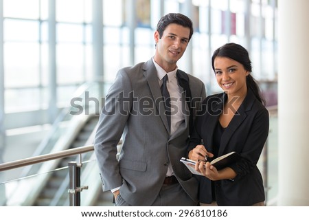 Business finance team young attractive members at the airport or convention event