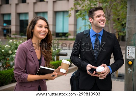 Playful fun laughing lifestyle of business executive persons work day coffee outdoors