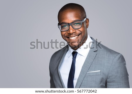 Similar – Image, Stock Photo Handsome Black Man with Earphones Posing on Big City Street