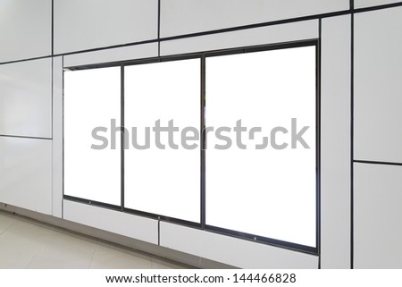 Three big vertical / portrait orientation blank billboard on white wall