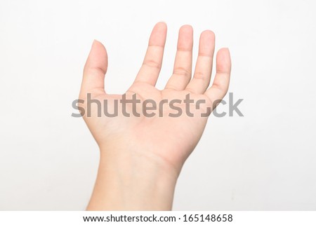 Men\'s left hand holding something