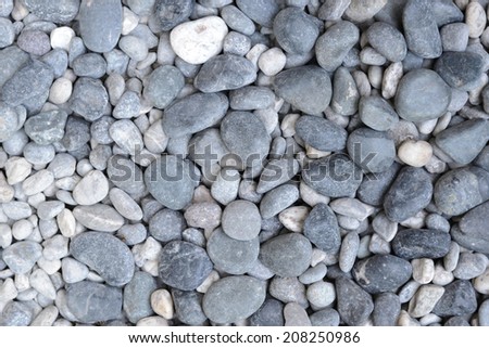 Abstract background with dry round reeble stones