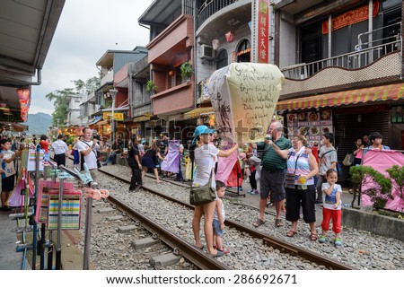Shifen, Taiwan - May 17, 2015 : The Shifen Old Street section of Pingxi District has become one of the famous tourist stops along this line.