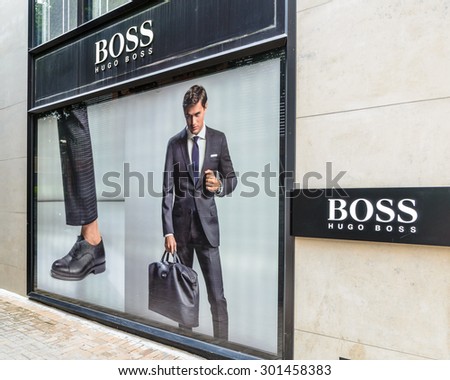 HONG KONG - MAY 7, 2015: A HUGO BOSS store. Based in Hong Kong. It has 12,000 staff, 840 own stores and 2012 sales of EUR 2.3 billion in 129 countries.