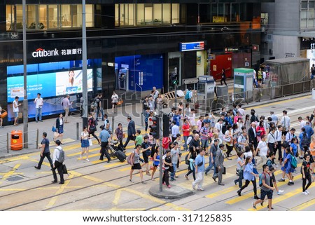 HONG KONG - AUGUST 24, 2015 - In the Streets of Hong Kong. Hong Kong became a colony of the British Empire after the First Opium War.
