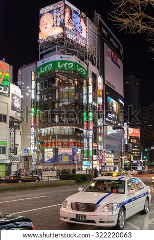 TOKYO - JAN 3: Billboards in Shinjuku\'s Kabuki-cho district January 3, 2015 in Tokyo, JP. The area is a nightlife district known as Sleepless Town.