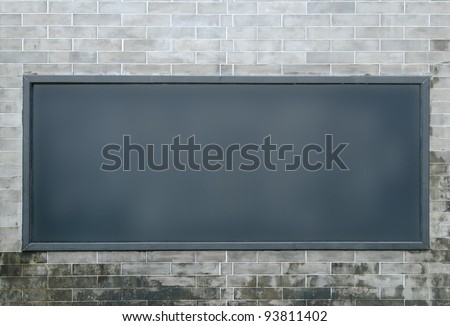 One big horizontal / landscape orientation blank billboard on Chinese brick wall