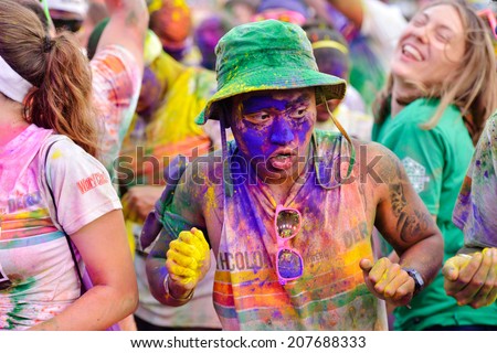 MAMAIA, CONSTANTA, ROMANIA - JULY 26: Mamaia color run 2014, in Mamaia, Constanta, on July 26, 2014. People from all walks of life participating in the fun summer run