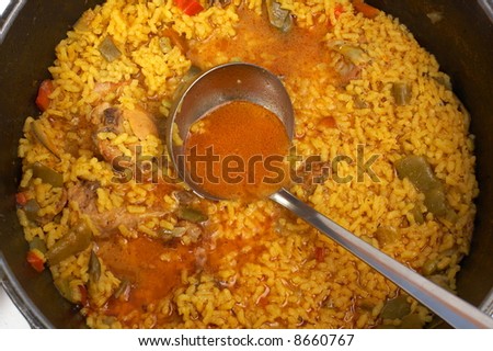 typical spanish soup with rice, meat and vegetables