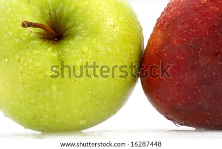 different colored apples on white background