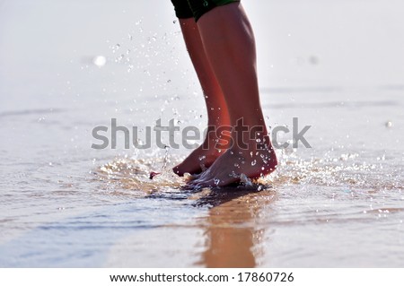 nice woman leg jumping in the water