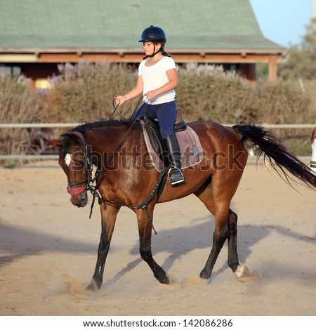 Little jockey and horse