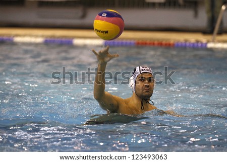 THESSALONIKI,GREECE-DECEMBER 04,2010:Unidentified water polo player during a game for The Greek Championship in Thessaloniki on December 04,2010