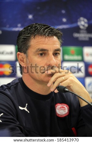 GREECE-ATHENS - FEB 24:Olympiakos coach Miguel Gonzalez (Michel) during the press conference for  the UEFA Champions League Last 16 in Piraeus on February 24,2014