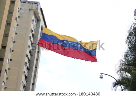 CARACAS, VENEZUELA - MARCH 5, 2014: Venezuelans protest in the street against the government for human rights violations and killings of civilians in peaceful demonstrations
