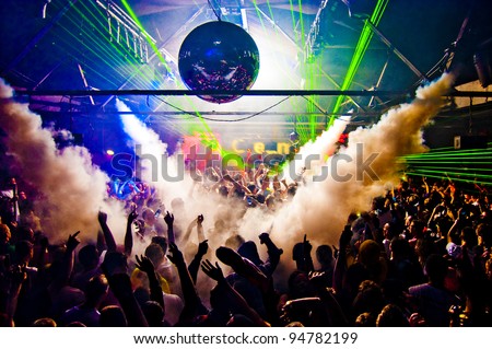 Hands In Air Rave With Smoke Machine and Laser Crowd - Nightclub