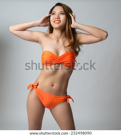 Young asian woman in bikini