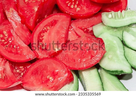 Sliced tomatoes and cucumbers for salad . Healthy eating diet  Foto stock © 