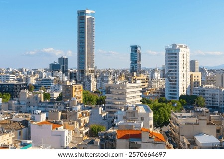 Similar – Image, Stock Photo Scenic cityscape with contemporary multistory buildings and wavy ocean