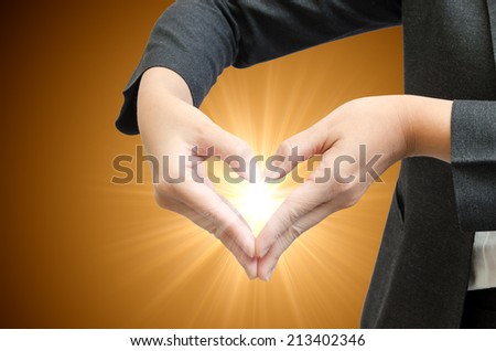 Heart hand with orange lighting