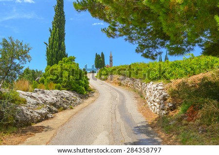 Mountain road to the Mediterranean gothic monastery