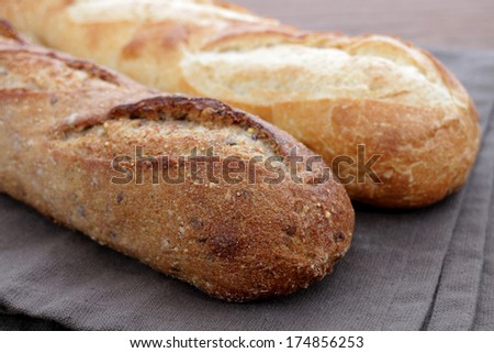 french bread baguette loaf on the table