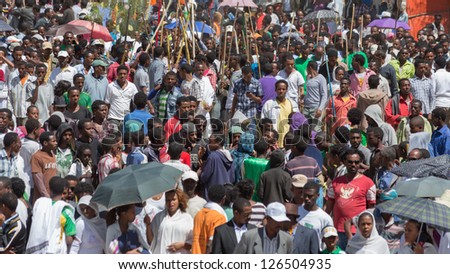 ADDIS ABABA, ETHIOPIA - JANUARY 19: A large crowd of people attending Timket celebrations of Epiphany, commemorating the baptism of Jesus in the river of Jordan, on January 19, 2013 in Addis Ababa, Ethiopia.