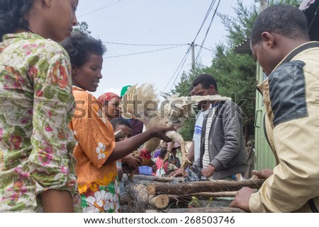 Addis Ababa: April 11: People bargain to buy roosters for the Easter Holidays at a local market on April 11, 2015 in Addis Ababa, Ethiopia
