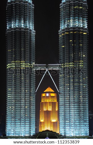 KUALA LUMPUR, MALAYSIA - MAY 19: Petronas Twin Towers on May 19, 2012 in Kuala Lumpur. Petronas Twin Towers are twin skyscrapers and were tallest buildings in the world from 1998 to 2004.