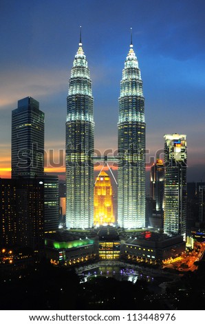 KUALA LUMPUR, MALAYSIA - MAY 19: Petronas Twin Towers at twilight on May 19, 2012 in Kuala Lumpur. Petronas Twin Towers are twin skyscrapers and were tallest buildings in the world from 1998 to 2004.