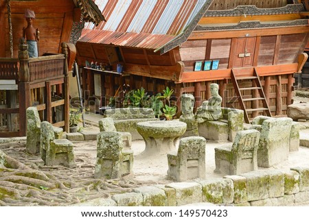 Samosir, Ambarita - Stone chairs used for judgement and executions.
