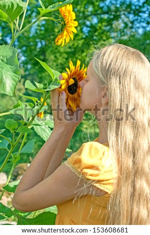 Girl with sun flowers