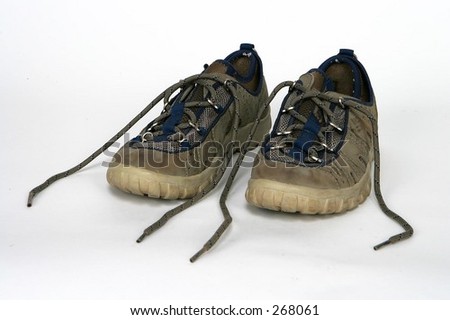 Dirty untied shoes
