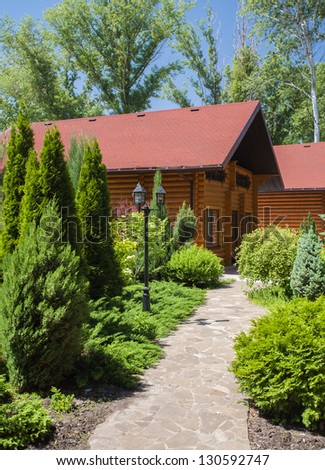 Holiday apartment - wooden cottage in summer forest