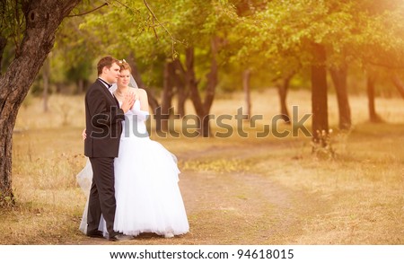 Romantic wedding couple having fun together outdoor in nature