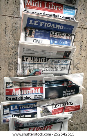 FRANCE - SEPTEMBER 24, 2011: Retail sale of french newspapers