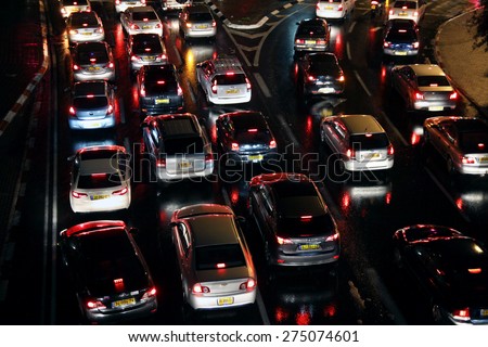 TEL AVIV, ISRAEL -  MARCH 13, 2014: Cars stand in a traffic jam in the evening
