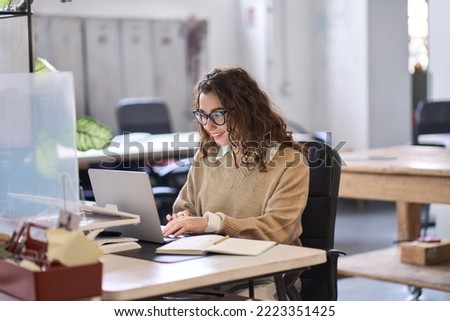 Similar – Foto Bild Junge Frau sitzt am Fenster