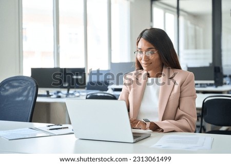 Similar – Image, Stock Photo African American lady using laptop in library to music