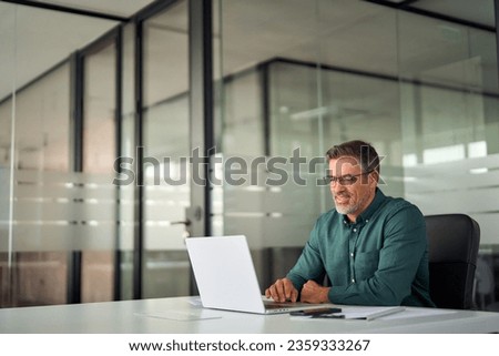 Similar – Image, Stock Photo Man working on laptop with his cat