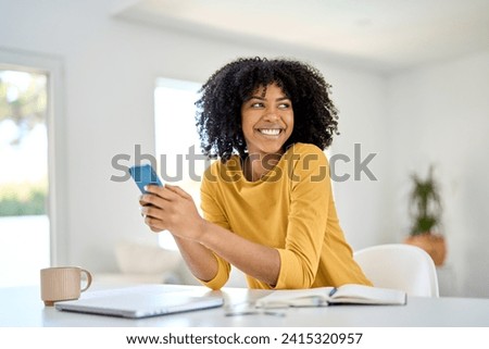 Image, Stock Photo Smiling African American woman resting on street