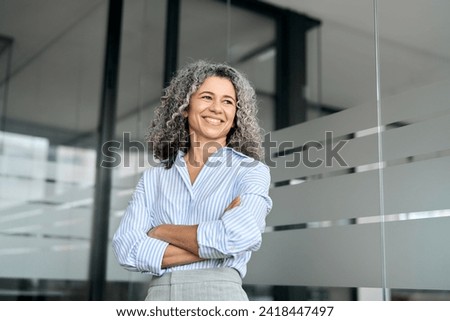 Similar – Image, Stock Photo Senior lady looking away from boardwalk